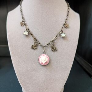 Elegant Pink and Gold Necklace with Floral Charm